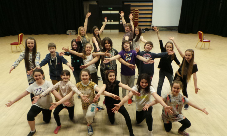 Young performers from Thomson-Leng Youth Musical Theatre at the Bonar Hall rehearsing for their debut in Broadway! a Musical Celebration.