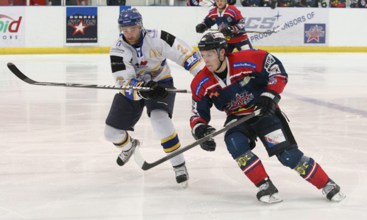 Fife Flyers Thomas Muir and Sam McCluskey of Dundee Stars fight for possession at the weekend.