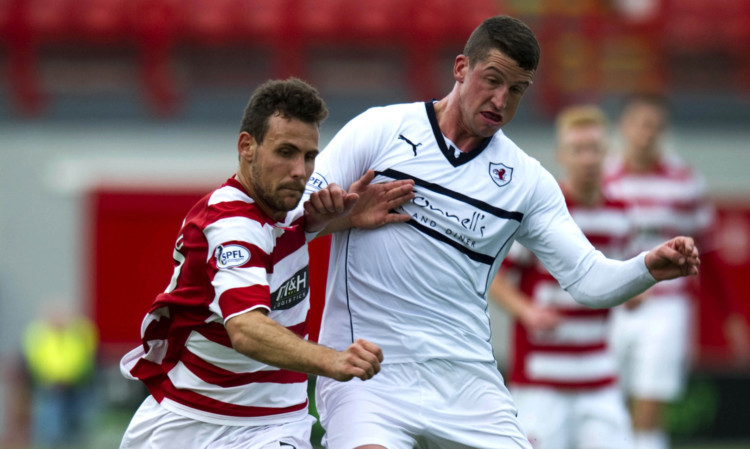 Hamiltons Tony Andreu, left, and Calum Elliot when the sides met at New Douglas Park in October.