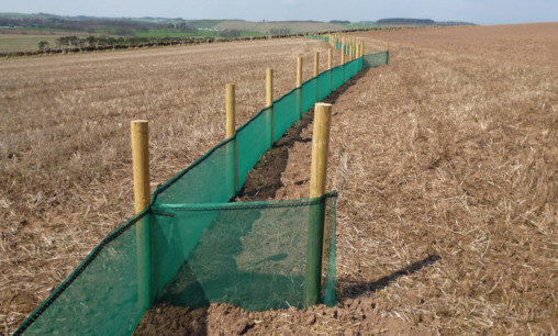 A soil erosion fence in place.