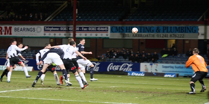 Kris Miller, Courier, News, 22/03/11. PIcture at Dens Park.

Dundee V Dunfermline.

Dundee trialist Jake Hyde's header beats Chris Smith.