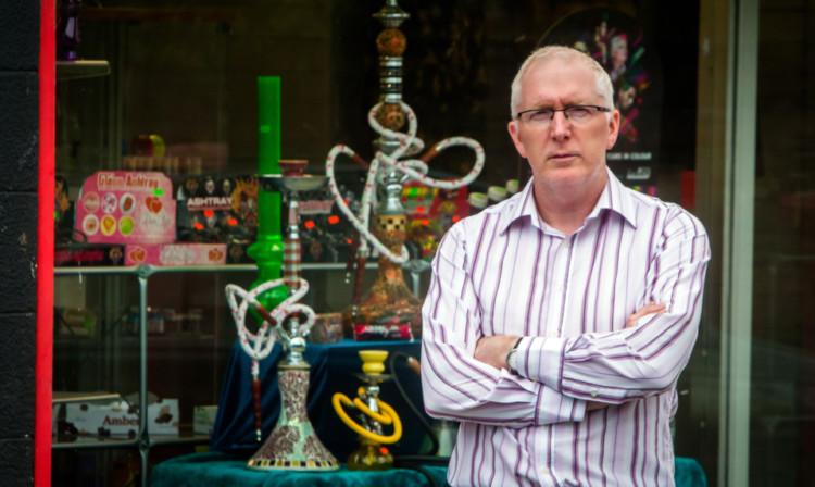 Rev Martin Fair outside a legal high shop.