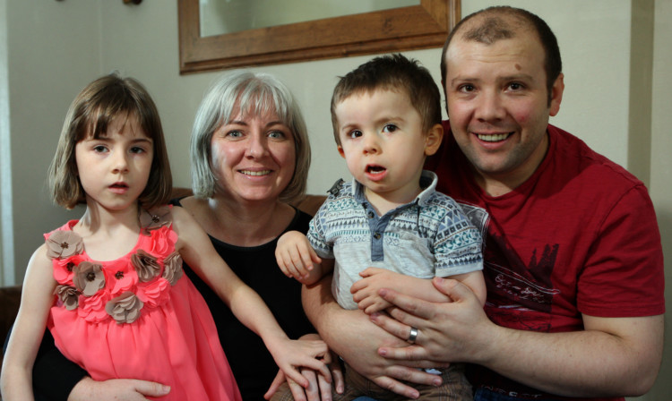 Oliver Bosch with sister Darcey and mum and dad Jemma and Ben.