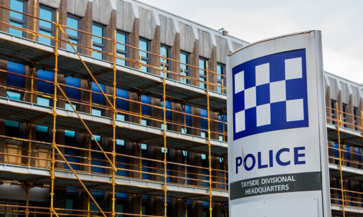 Work being carried out to replace the windows at Police Scotland Tayside Divisional Headquarters on Bell Street.