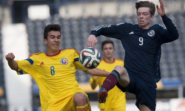 Craig Wighton in action for Scotland.