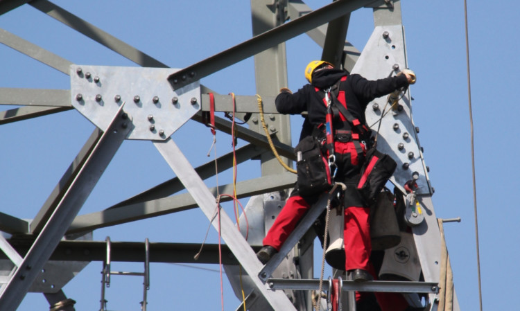 SHE has awarded contracts worth a total of £450m for new and upgraded power lines in the north of Scotland.