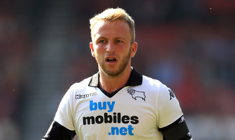 Johnny Russell moved to Derby County in a £750,000 deal.