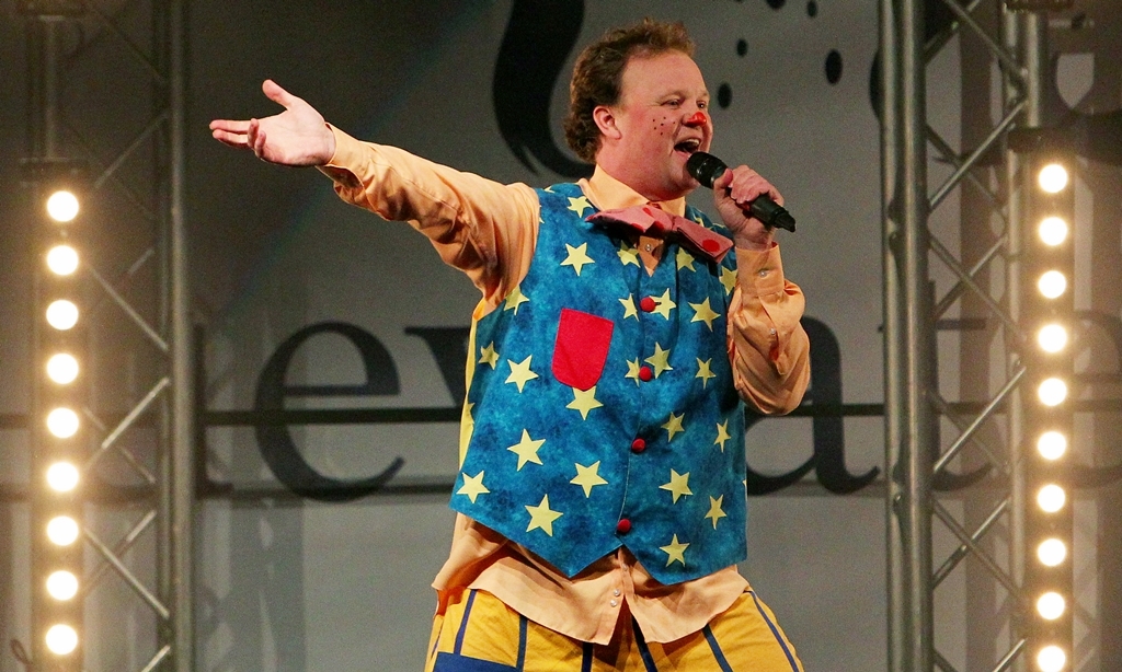 Justin Fletcher, children's television personality 'Mr Tumble' performs before the switch on of the christmas lights at the Bluewater shopping centre in Greenhithe, Kent.