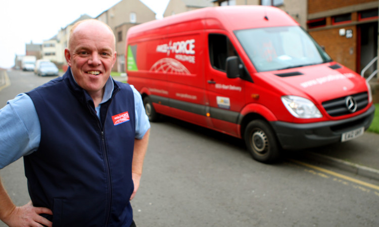 Brian rescued the woman from a burning building while out delivering for Parcelforce.