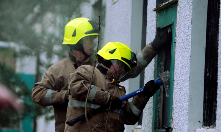 Firefighters at the scene of the blaze.