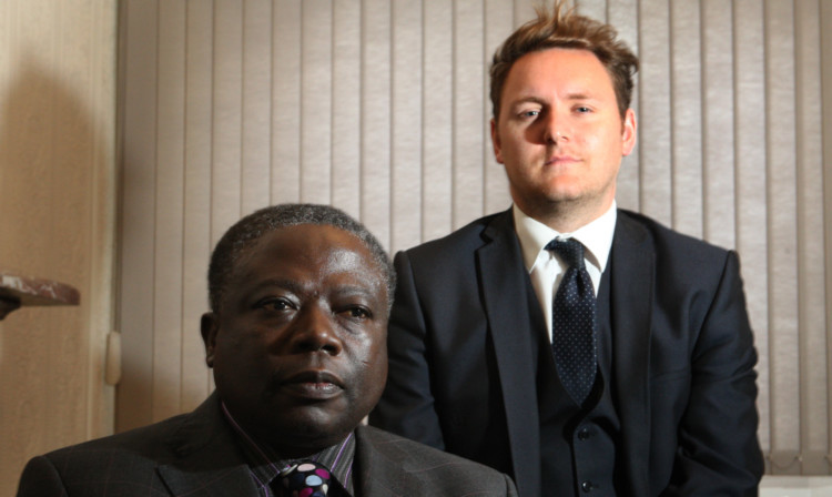 James Owusu with solicitor Ryan Russell, of Muir Myles Laverty.
