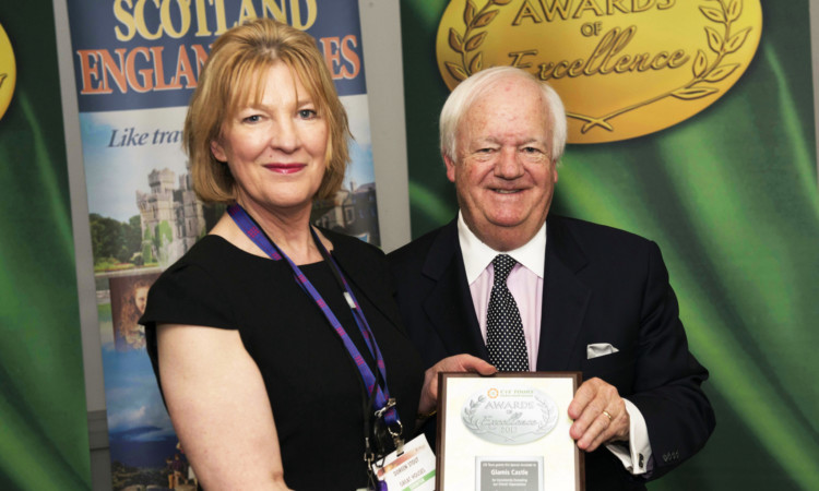 Doreen Stout of Glamis Castle receives the award from Brian Stack, managing director of CIE Tours International.