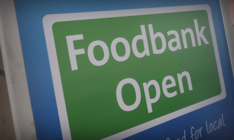 Kim Cessford - 30.11.13 - pictured at the Montrose Tesco store where volunteers with the Angus Foodbank were collecting donations from members of the public - foodbank sign