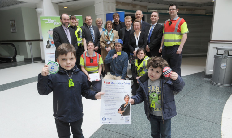 Jack and Ben Davidson help launch Police Scotlands initiative to help tackle doorstep crime.