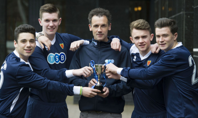 Christian Dailly, a former Scotland schoolboy international, with current stars, from left: Michael Hopkin, Kyle Chalmers, Jamie Henry and Craig Quinn.