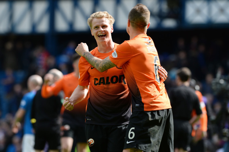 Dundee United and St Johnstone will meet in the Scottish Cup final at Celtic Park in May after both sides came through their respective semi-finals. The Tangerines beat Rangers 3-1 while the Saints overcame Aberdeen 2-1. Gary Mackay-Steven (left) and Paul Paton celebrate at full-time.