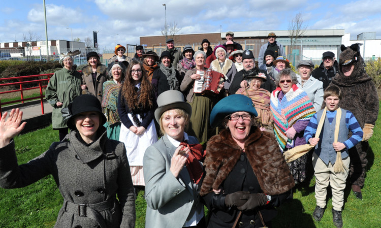 Some of the members of Whitfield Community Choir (Voices in Harmony) and the Dighty Troupe at the Longhaugh Races held on the green space next to Longhaugh Primary School.