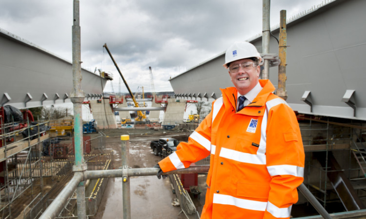 Transport minister Keith Brown visits the site of the new Forth Crossing to see how it's coming along.