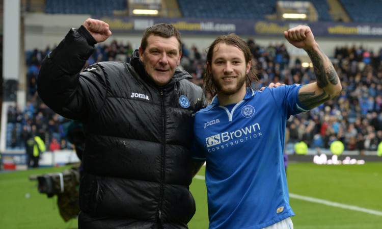 St Johnstone manager Tommy Wright celebrates with double goalscorer Stevie May after the final whistle.