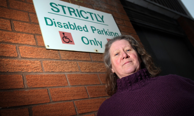 Joyce Fox is fed up with able-bodied people parking in disabled spaces at Arbroath Sports Centre.