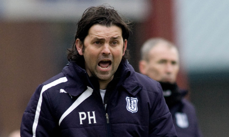 Dundee manager Paul Hartley expects a tough clash at Cappielow.