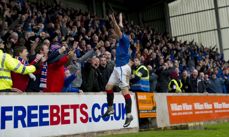 Forbes ended up on the pitch while celebrating Nicky Clark's winning goal for Rangers.