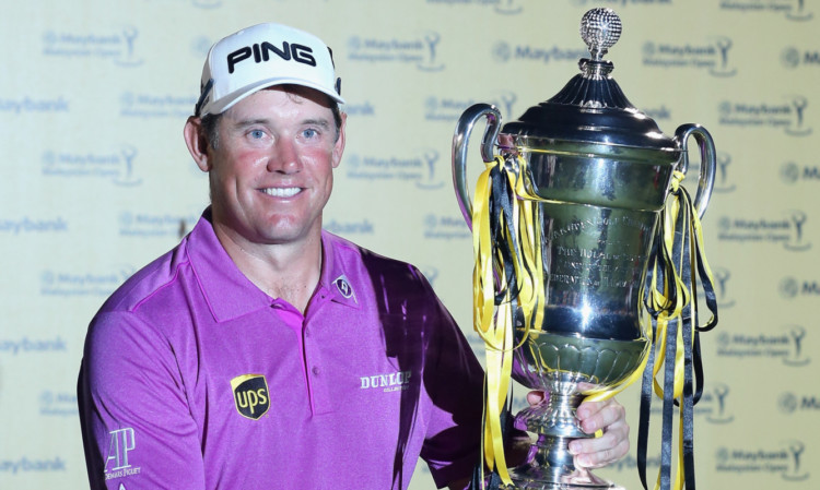 KUALA LUMPUR, MALAYSIA - APRIL 20:  Lee Westwood of England celebrates with the trophy after winning the Final round of the 2014  Maybank Malaysian Open at Kuala Lumpur Golf & Country Club on April 20, 2014 in Kuala Lumpur, Malaysia.  (Photo by Ian Walton/Getty Images)