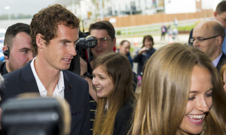 Andy Murray arrives at Dunblane High School with his girlfriend Kim Sears.