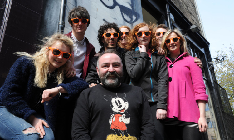 Back, from left: Kristen Neillie, Dale Easson, Marko Fleming, Kelly Stuart, Alyssa MacKenzie and John and Laura Anderson. Front: Richard Cook.