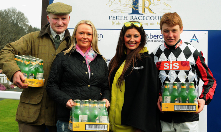 The Crabbies Alcoholic Ginger Beer Mares Handicap Hurdle, won by Golden Sparkle. Shown are (from left) trainer Ian Duncan, owner Helen Cross, Claire McEwan from Crabbies and jockey Graham Walters.