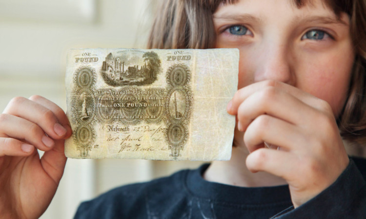 A replica of the 150-year-old one pound note.