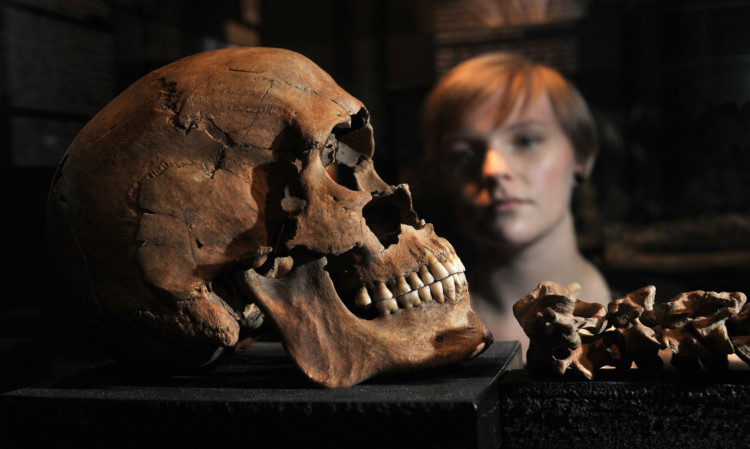 Gillian Ramsay beside one of the skeletons on display.