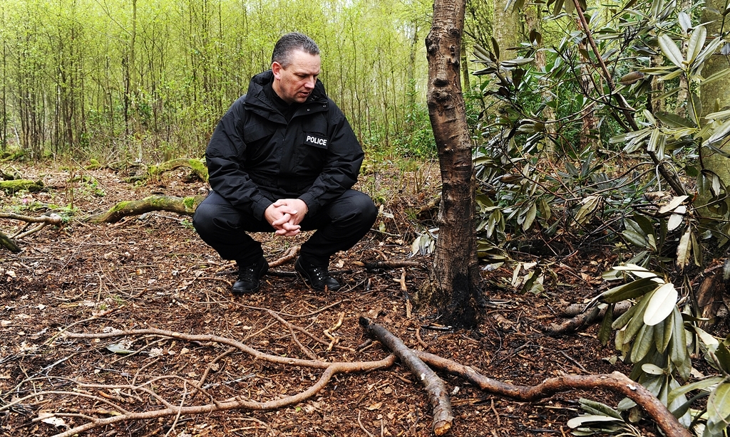 Ian Laing checks the area where the dog's remains were found

(c) David Wardle