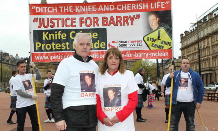 Alan and Petina McLean campaigning for justice for their son, Barry.