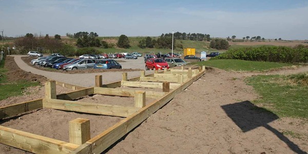 Kim Cessford, Courier - 10.04.11 - work continues on the controversial upgrade of the carpark at Lunan Bay