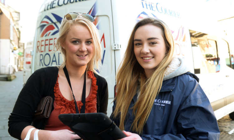 Alyssa James with Courier roadshow team member Lauren McKinney in Burntisland.
