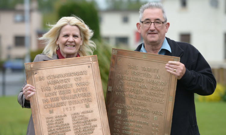 Councillor Kate Stewart and Rab McKenzie with the plaques.