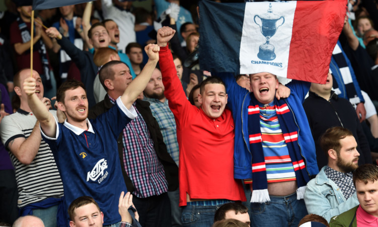 Dundee fans celebrate going back to the top flight.