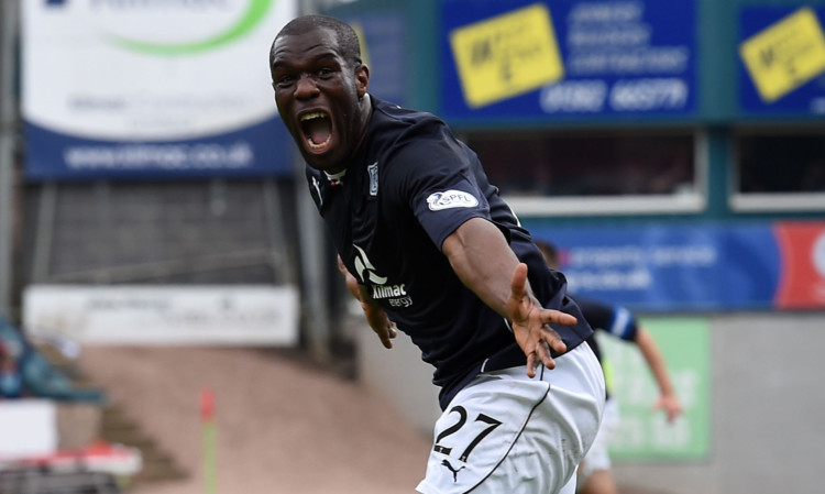 Christian Nade rushes to celebrate after putting Dundee into the lead.