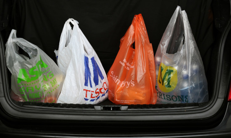 The big four supermarkets are being squeezed between discount retailers and upmarket rivals.