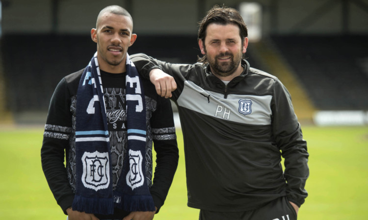 Dens welcome: Dundees new signing Phil Roberts with Dark Blues boss Paul Hartley.