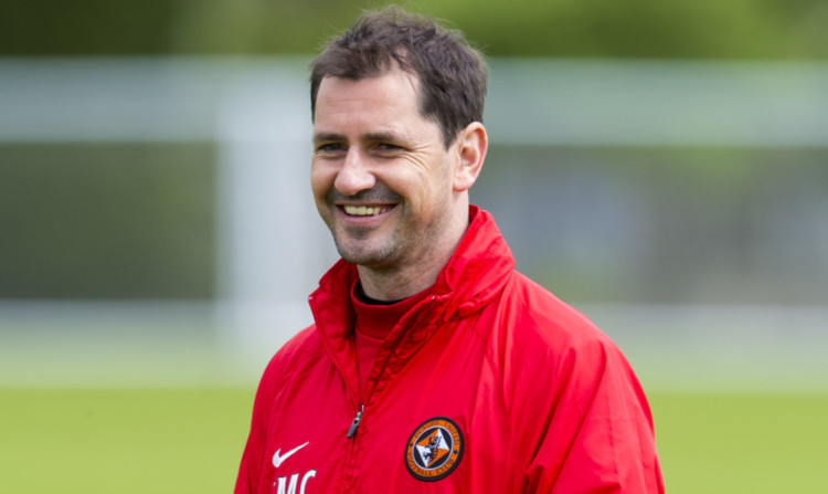 Jackie McNamara says he is committed to his role at Tannadice.
