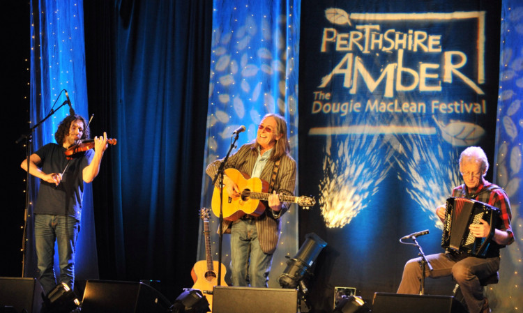 Dougie MacLean performing at a previous Perthshire Amber.