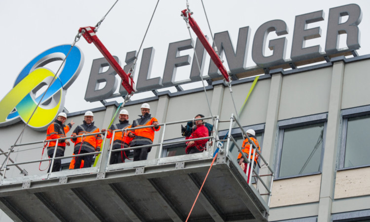 Bilfinger executives at the unveiling of a company logo at their HQ in Germany.  The Mannheim-based construction, engineering and services group is looking to take over commercial property adviser GVA in a deal which would reportedly be worth more than £150 million Picture: UWE ANSPACHW.