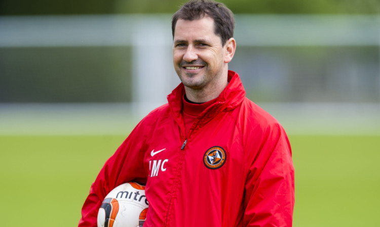 09/05/14
DUNDEE UTD TRAINING
ST ANDREWS
Dundee United manager Jackie McNamara is all smiles during training.