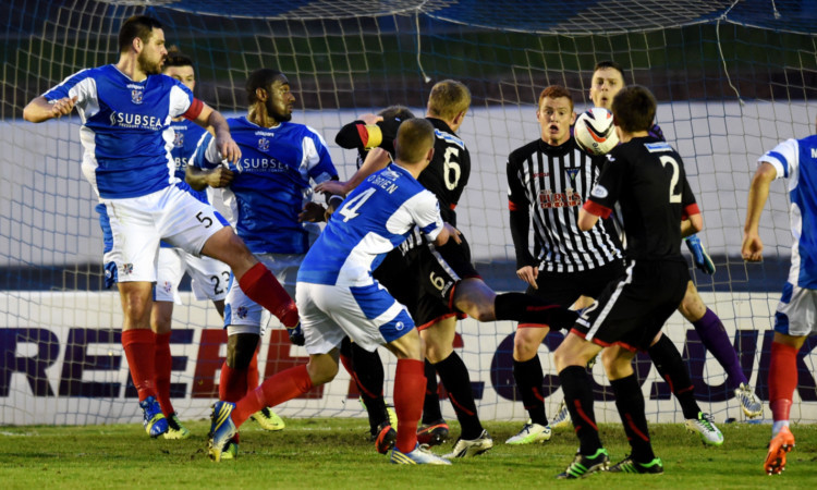 Andy Geggan (no 6) rises above the Cowden defence to put the Pars ahead.