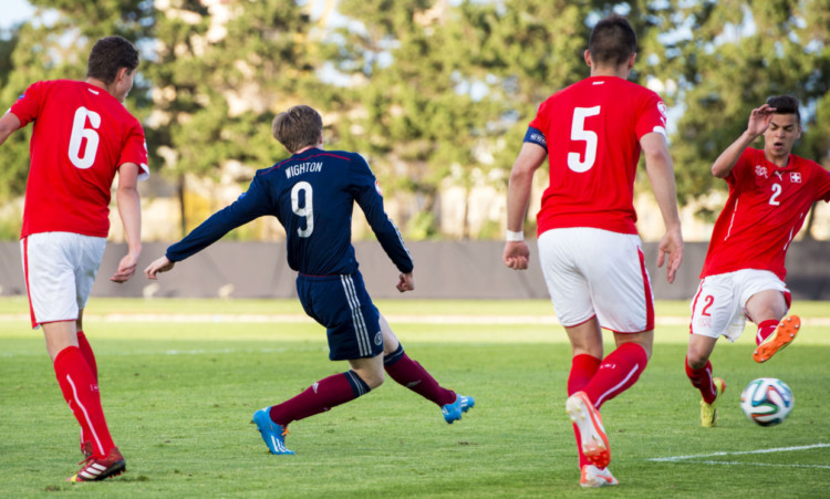 Dundee striker Craig Wighton levels the scores in Malta.