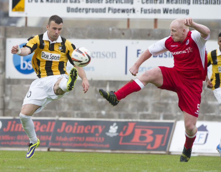 18/05/14 SCOTTISH LEAGUE ONE PLAY-OFF FINAL 2ND LEG
EAST FIFE v STIRLING ALBION
BAYVIEW - METHIL 
East Fife's Kevin Smith (left) is challenged by Chris Smith.