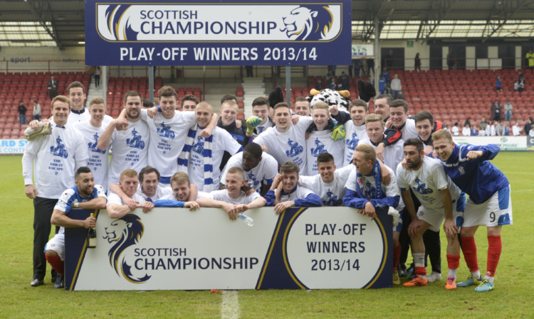 Cowdenbeath players celebrate securing safety.