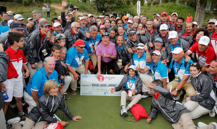 Miguel Angel Jimenez celebrates with the the marshalls.